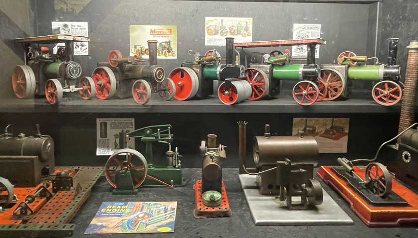 Toy steam engines on display.