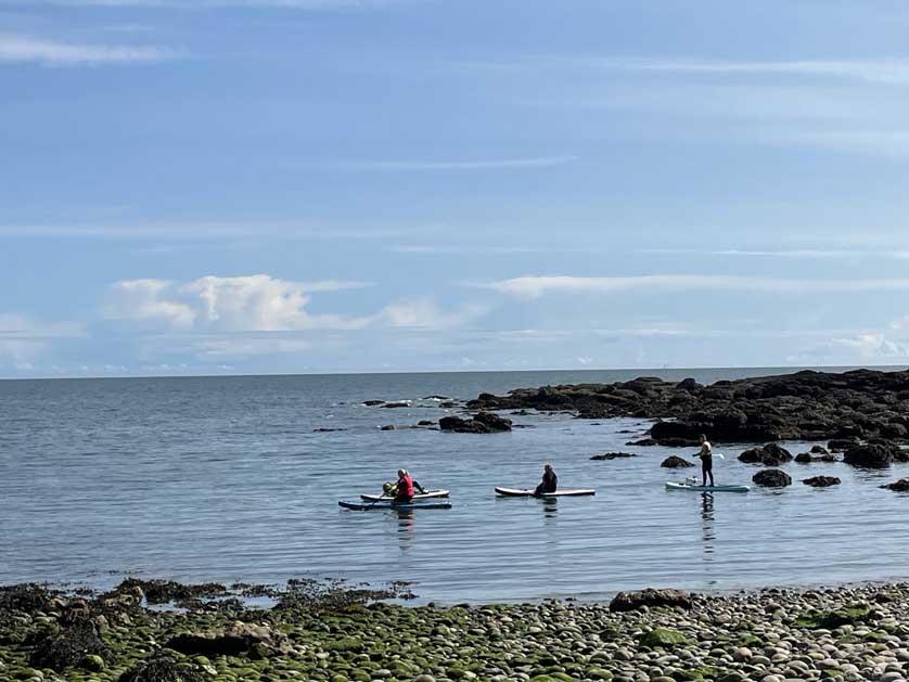 Sea kayaks at Auchmithie Beach.