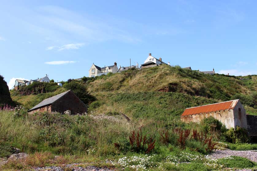 The village is perched 120 feet above the shingle beach.