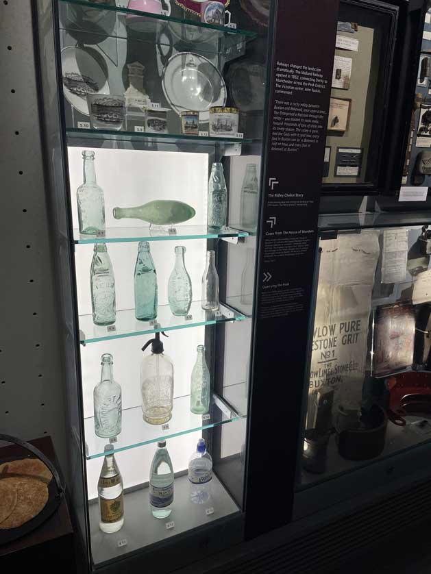 Bottles for Buxton mineral water through the ages.