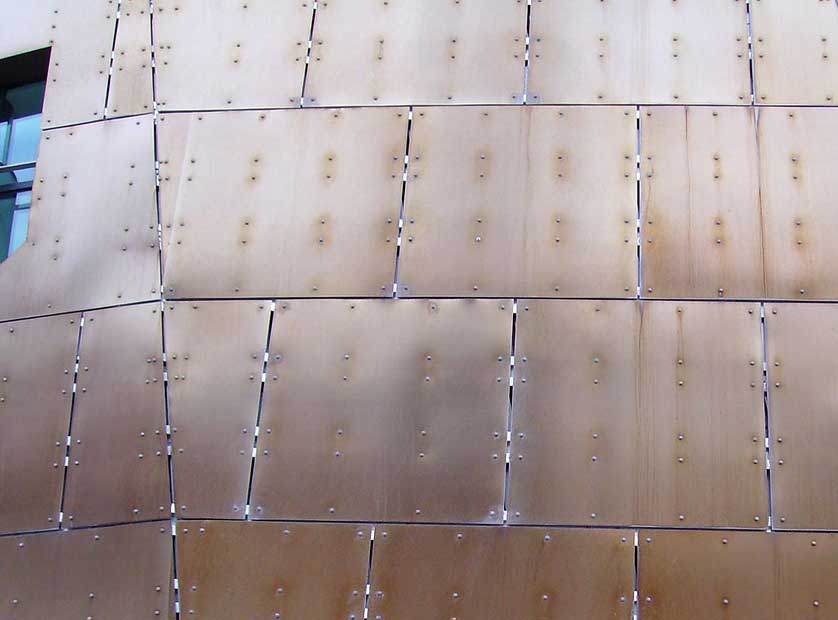 Copper oxide coated sheet steel cladding.