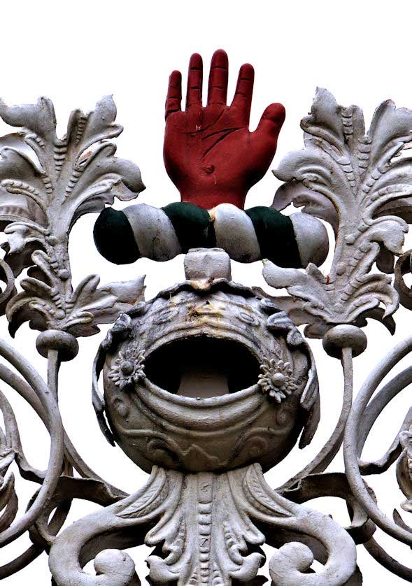 The red hand of the Myddleston family crest.