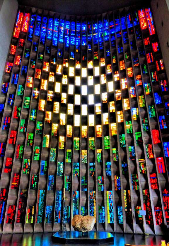 The Baptistry Window with 195 stained glass panels designed by John Piper.