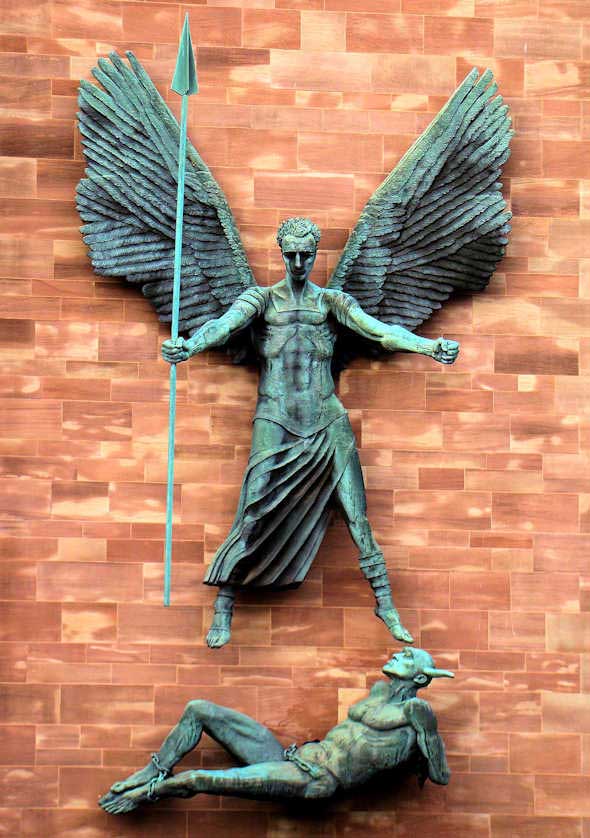 Attached to the exterior of Coventry Cathedral a bronze sculpture of St. Michael subduing the Devil designed by Jacob Epstein.