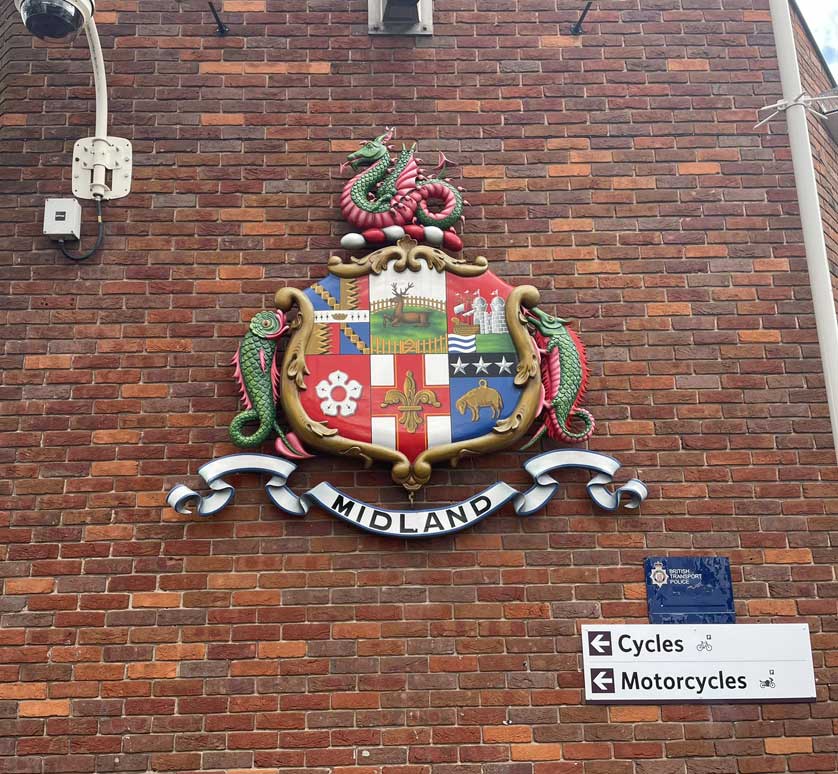The Midland Railway's coat of arms at the station's entrance.