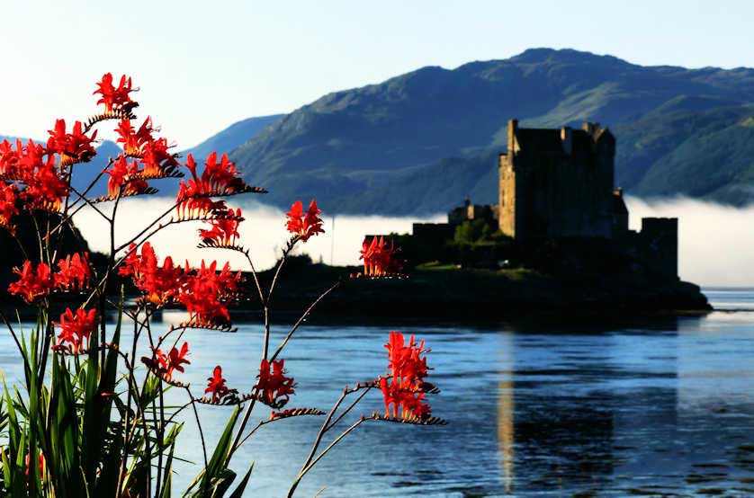 Early morning mist shrouds Eilean Donan Castle.
