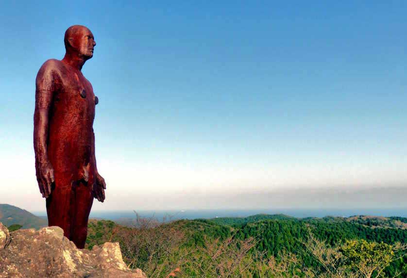 Another Time, a 1999, life-size iron figure by Antony Gormley.