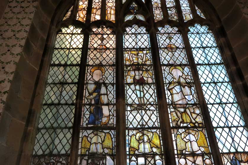 Stained glass in the chapel at Haddon Hall, Derbyshire.