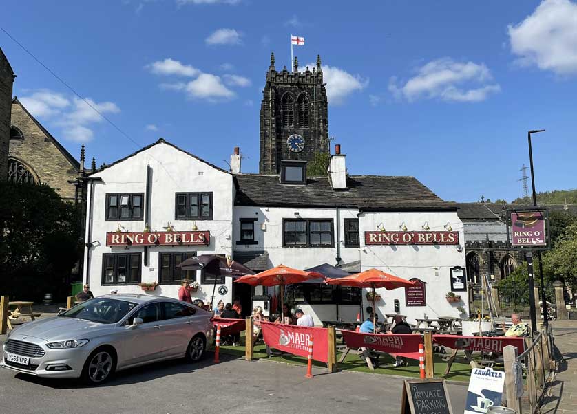 The nearby Ring o' Bells public house with the Minster in the background.