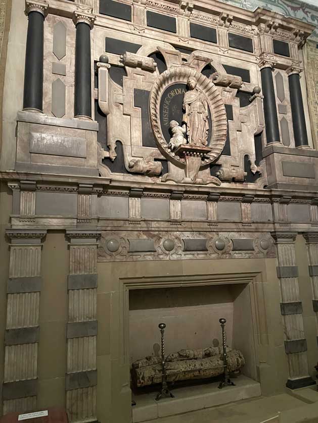 The fireplace in the gallery.