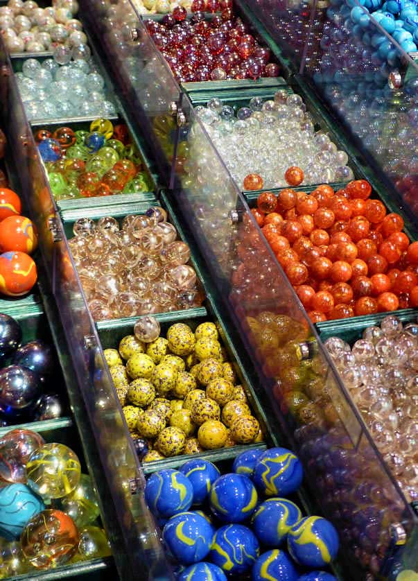 Marbles are just one of the many toys and games manufactured and sold by House of Marbles including board games, puzzles, classic games and toys, and a wide range of decorative home items.