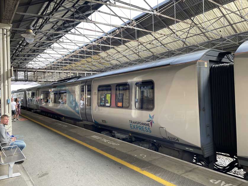 A train at the platform at Huddersfield station.