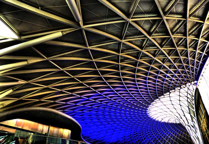 Using natural and artificial light, the roof of Kings Cross Station's new concourse seems to float.