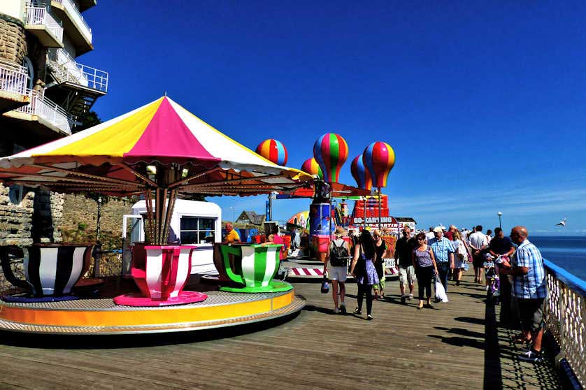 Rides for kids at the entrance to Llandudno Pier.