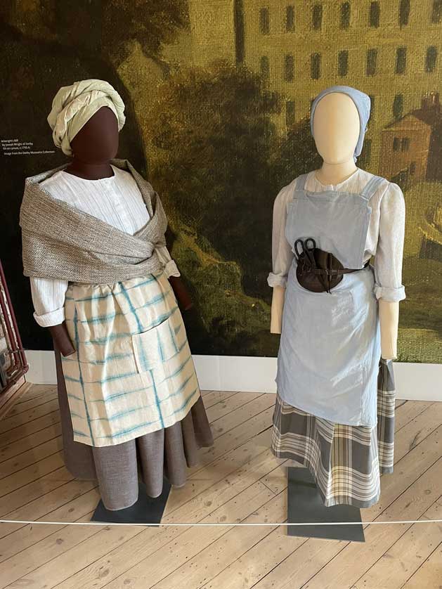 Mannequins of mill workers.