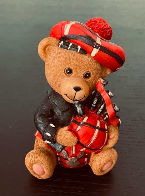 Paddington Bear with bagpipes.