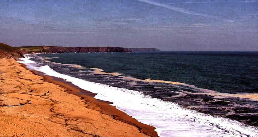 Loe Bar, a sandbar separating the sea and The Loe.