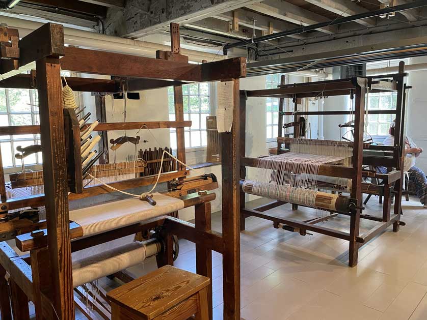 Early industrial machinery on display at The Mill.