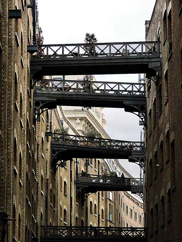Gangways and bridges high above street level connect former warehouses.