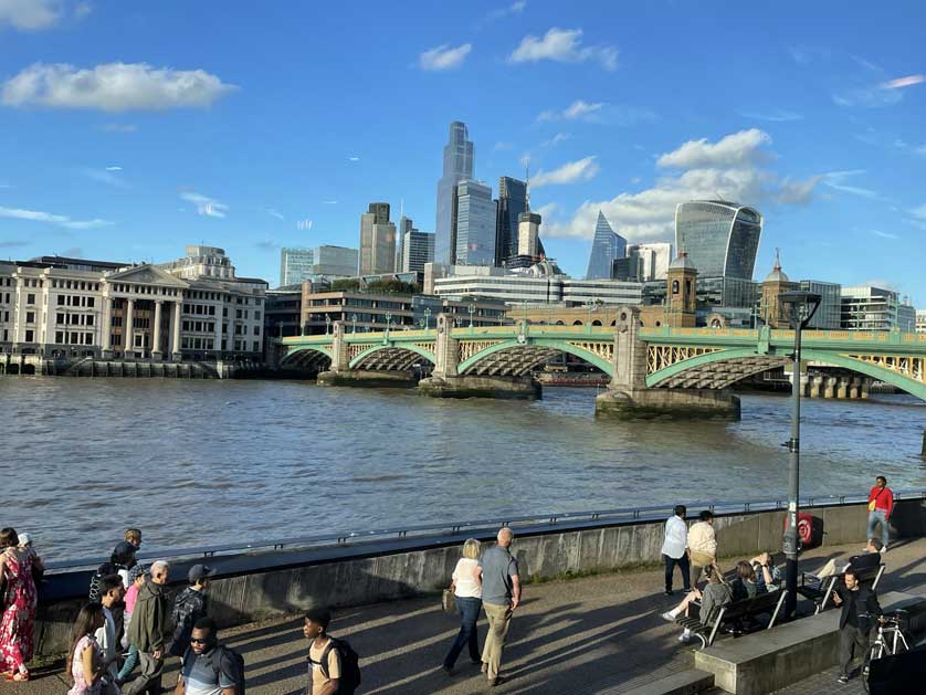 London high rise buildings and Southwark Bridge from The Embankment.