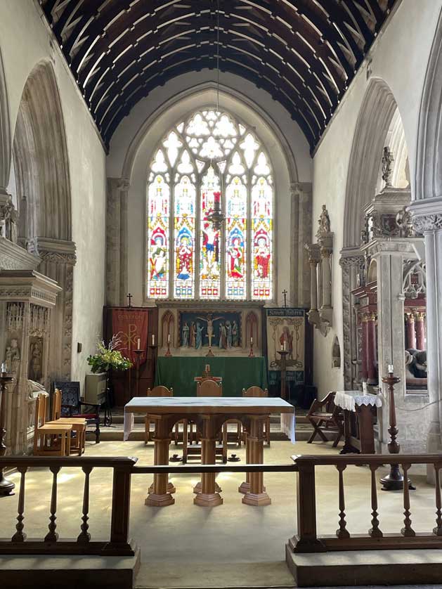 The church altar and stained glass.
