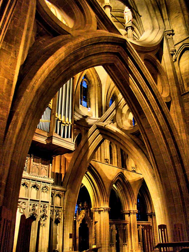The scissor arches were constructed on three sides of the great central tower by master mason William Joy.